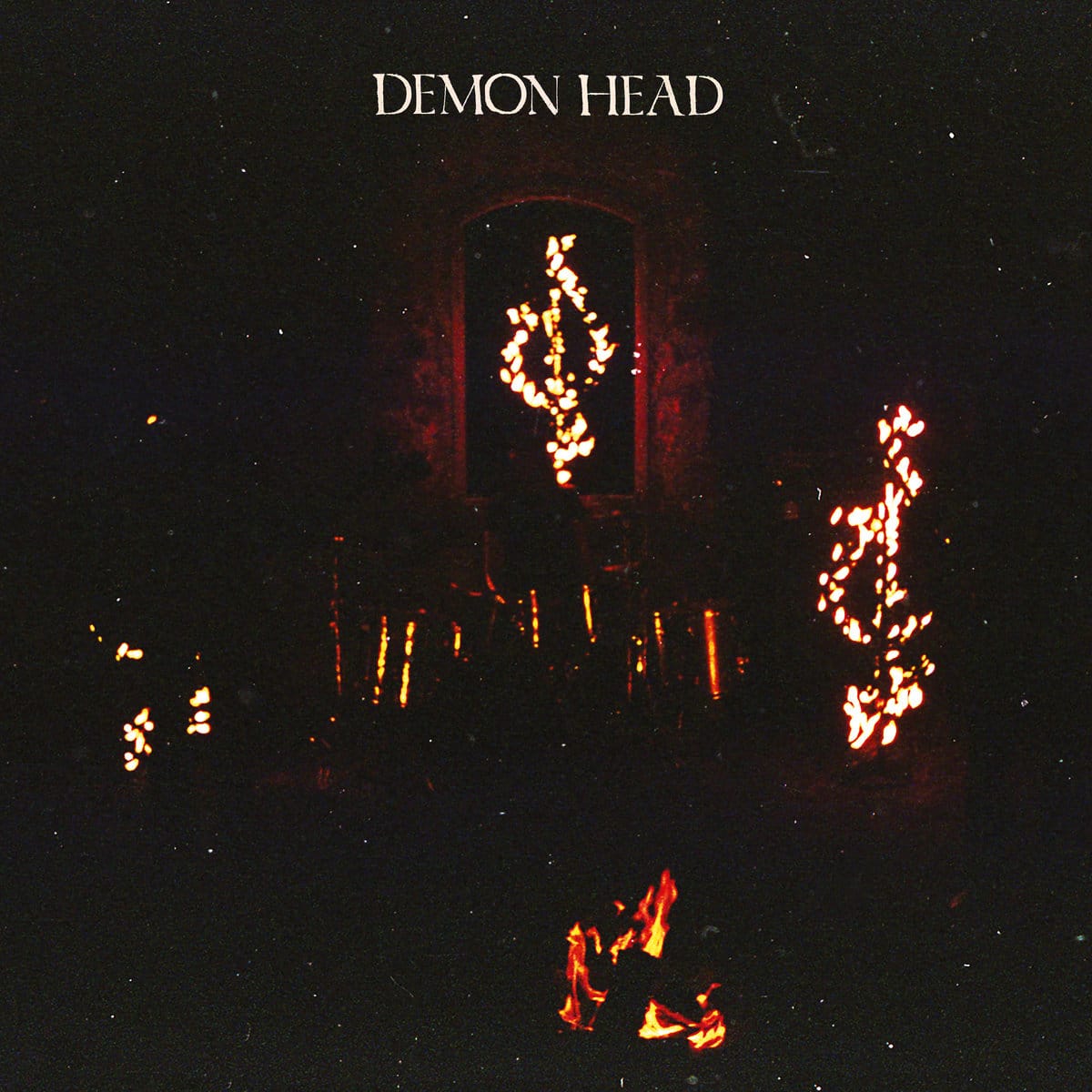 Demon Head Through Cover